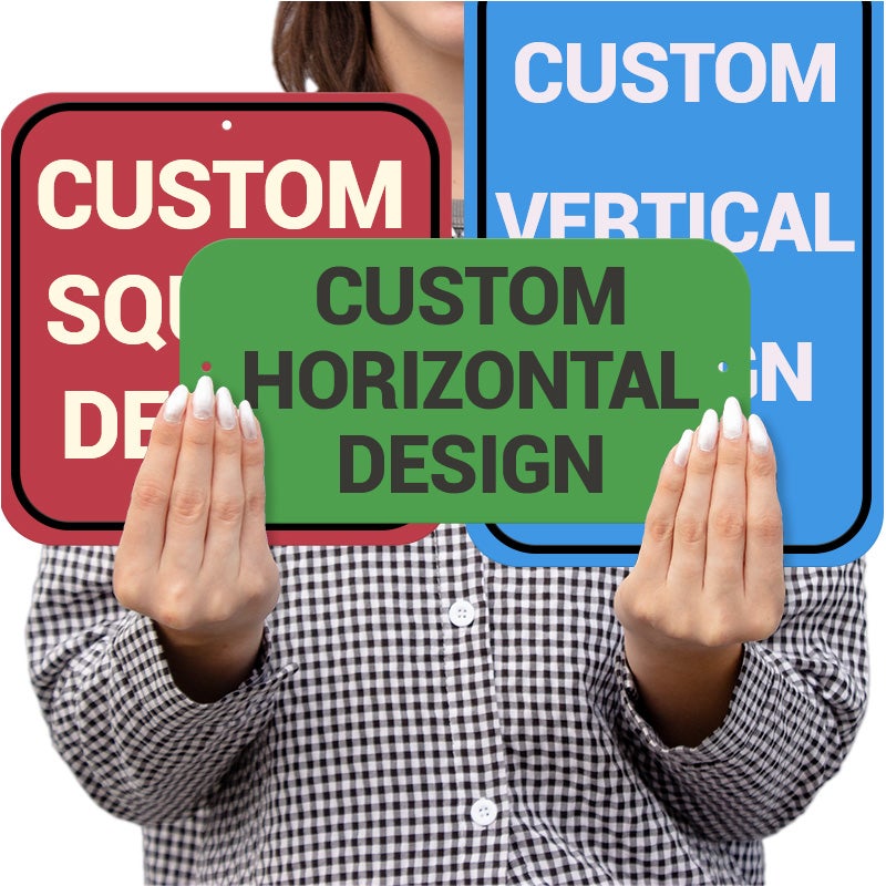Person Holding Multiple Sizes Of Custom Aluminum Signs