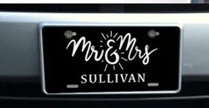 mr and mrs vanity plate on car