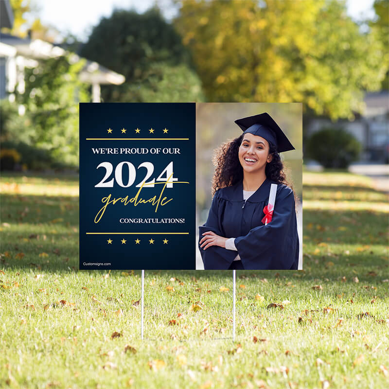 Star and Script custom graduation yard sign displayed in a front yard