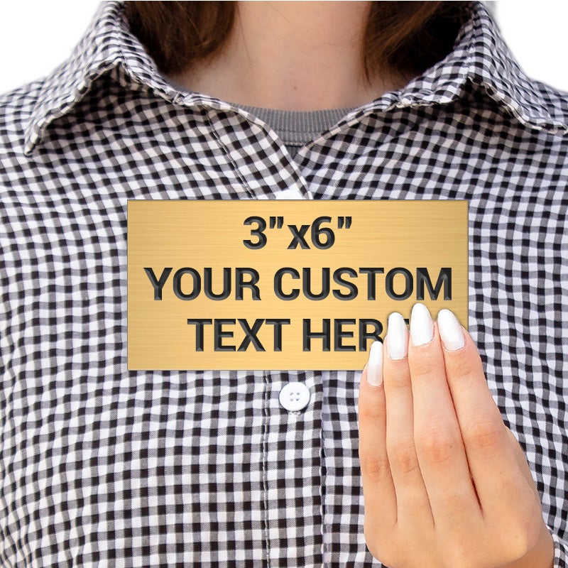 Person Holding A 3 By 6 Custom Engraved Brass Sign