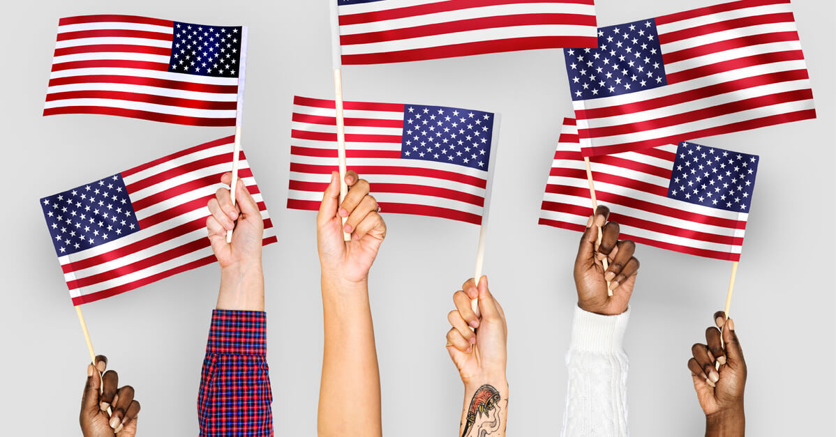 Interracial Group of People Waving Small American Flags