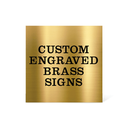 Custom engraved brass sign with oxidized letters