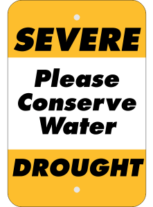 White & Yellow Sign with Black Lettering that Reads "SEVERE DROUGHT, Please Conserve Water"